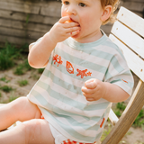Übergroßes T-Shirt für Kinder Gestreifte Muscheln in Seegrün